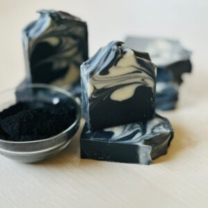 Charcoal soap scented with tea tree