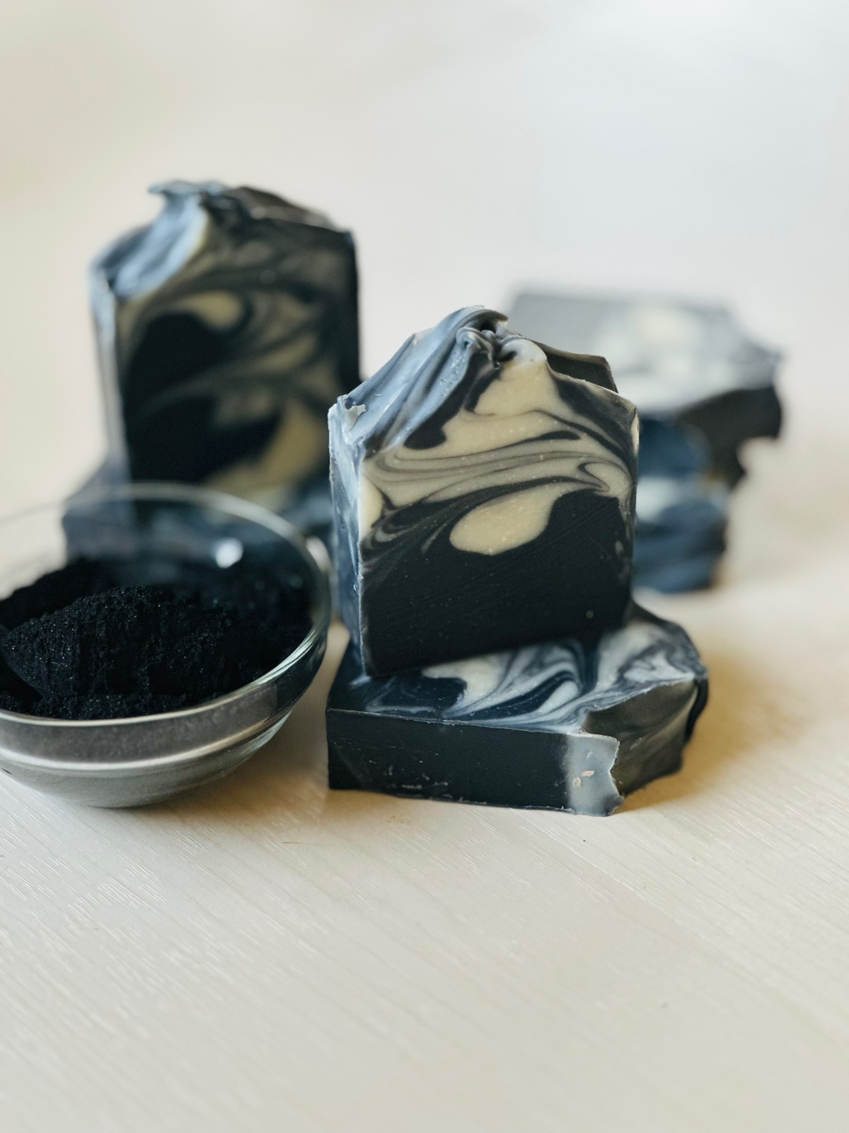 Charcoal soap scented with tea tree